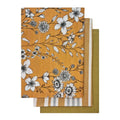 alt="Set of yellow tea towels feature one printed design, one striped design and one plain waffle."
