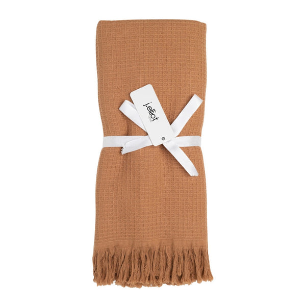 alt=" A 100% cotton, waffle weave front, terry fabric underside, and decorative fringe accents hand towels"