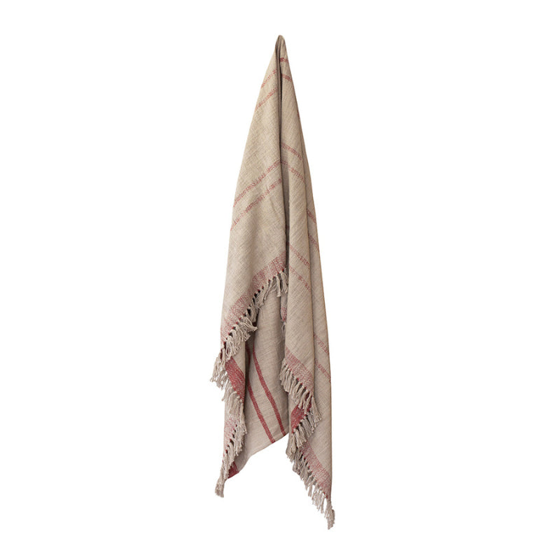 alt="Back view of a Cassidy Throw with subtle stripe design, tassel accents"