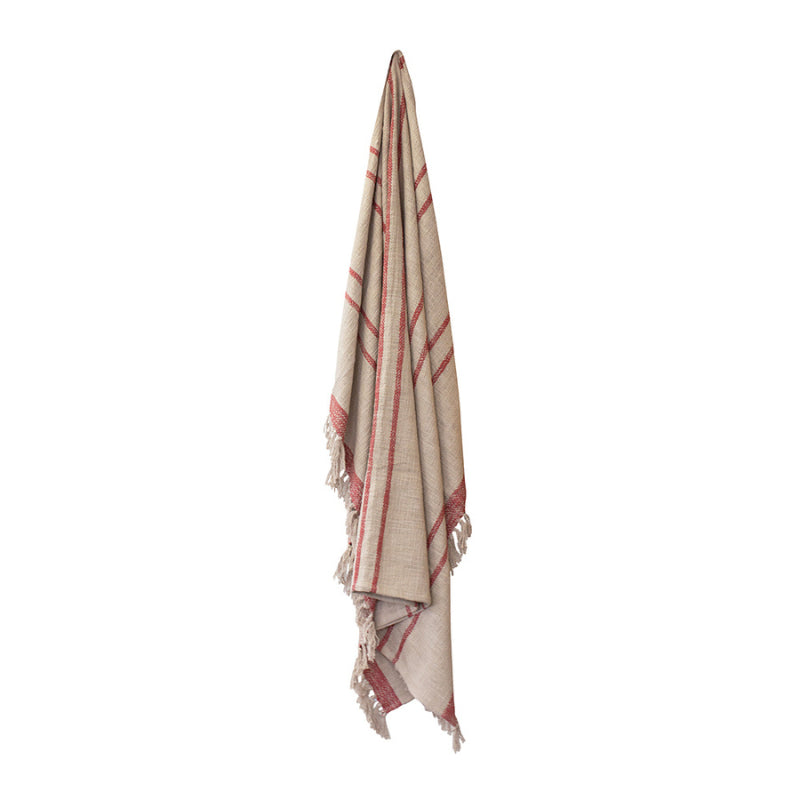 alt="Front view of a Cassidy Throw with subtle stripe design, tassel accents"