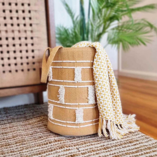 alt="A stylish, mustard and white, eco-friendly, and durable cotton basket with a modern chic design for a clutter-free and organised home."