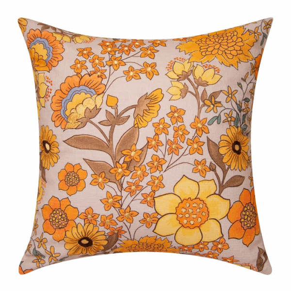 alt="Front details of a yellow multicoloured cushion featuring beautiful and bold florals"