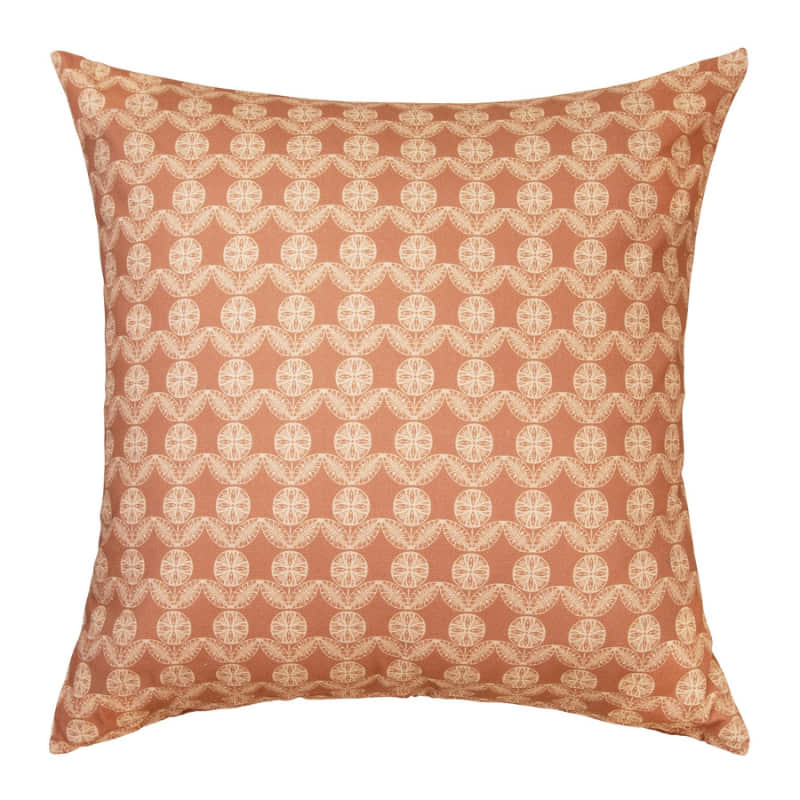 alt="Front details of a brown cushion featuring a rustic boho design printed"