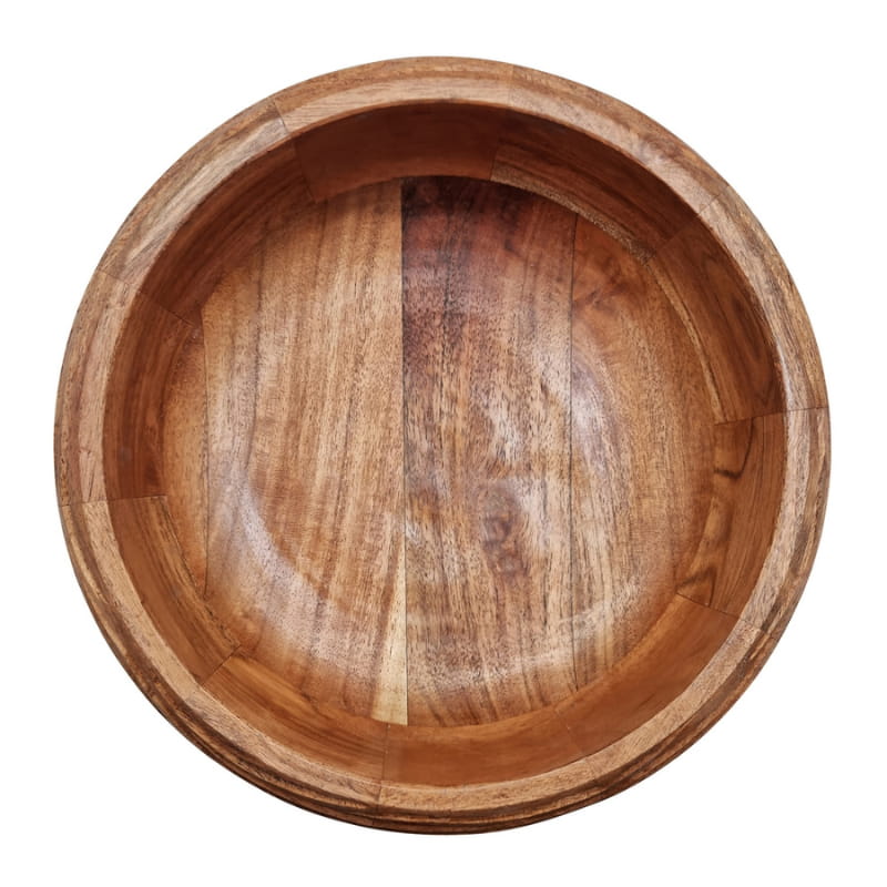 alt="Front details of a fruit bowl crafted from carved acacia wood for a touch of texture, the bowl rests upon a slap of terrazzo pairing beautifully with the brown tones of the acacia." 