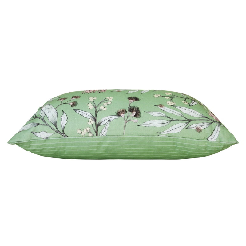 alt="Side details of a green multicoloured cushion inspired by Australian flora and fauna."