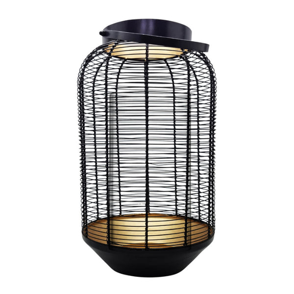 alt="Front details of a black lantern featuring a beautiful golden shade on the inside"