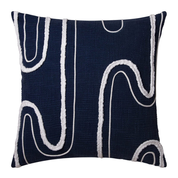 alt="Front details of a navy blue cushion featuring a curved white cotton braids."