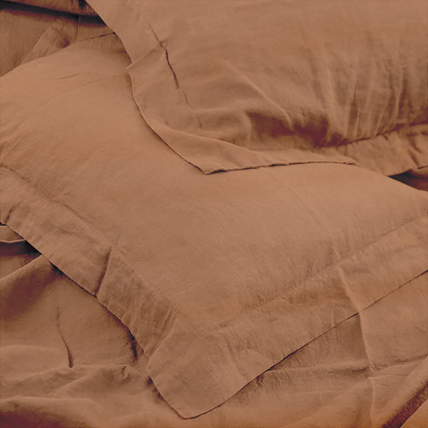 Luxurious Jenny Mclean Doux Pure Linen Pillowcases made from Egyptian cotton, offering smooth texture and natural aroma for restful sleep.