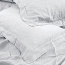 Luxurious Jenny Mclean Doux Pure Linen White Pillowcases made from Egyptian cotton, offering smooth texture and natural aroma for restful sleep.
