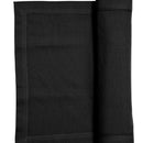 A black runner elegantly folded, enhancing the sophistication of the dining experience.