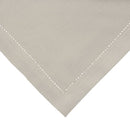 An oatmeal napkin adding sophistication and elegance to the overall table decor.