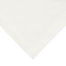 A white napkin adding sophistication and elegance to the overall table decor.