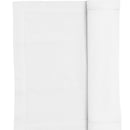 A white runner elegantly folded, enhancing the sophistication of the dining experience.