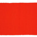 A sophisticated red ribbed placemat, enhancing dining experiences with style and protection.