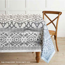 A vintage tablecloth featuring a classic pattern and artistic border, enhancing both formal and informal dining experiences.