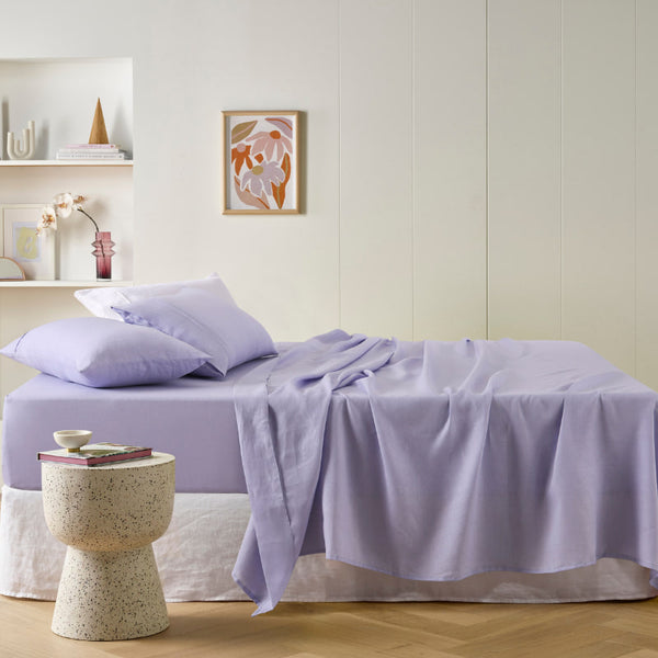 alt="A purple sheet set is lightweight, breathable and keeps cosy in winter"