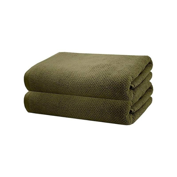 alt="Green soft cotton bath towels"