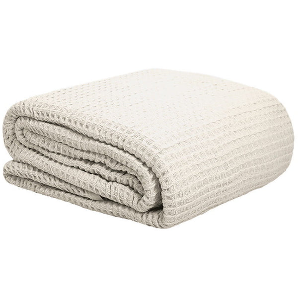 alt="Classic waffle weave pattern natural cotton blanket"