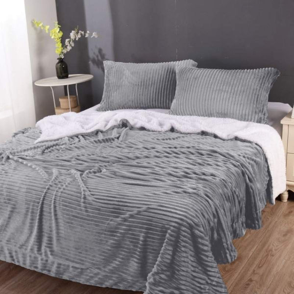 Elegant silver comforter set with chic 3D stripe pattern, made of premium microfibre polyester for year-round comfort.