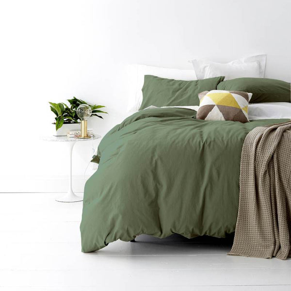 alt="A shade of green quilt cover is soft, stylish percale bedding set made of fine cotton percale. Timeless design for modern bedrooms."